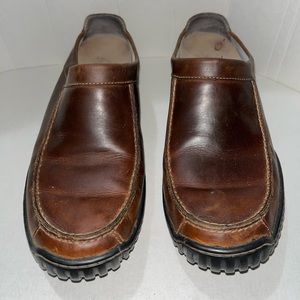 Brown leather Clarks slide loafers in women's size 9 1/2M.